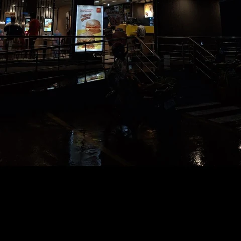 Fast food restaurant lit up at night